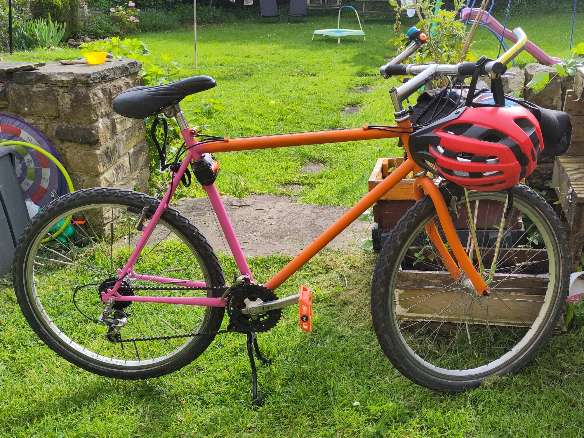 Orange and pink hybrid bike